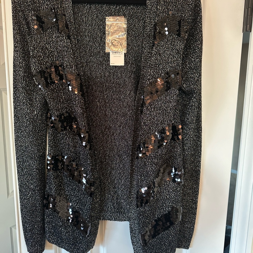 Selling a NEW Holiday Cardigan Dana Bachman size Large with tags